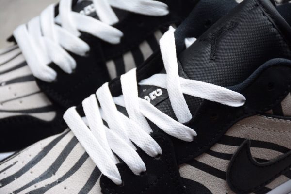 Jordan 1 Low Zebra (GS) 553560-057 - Image 5